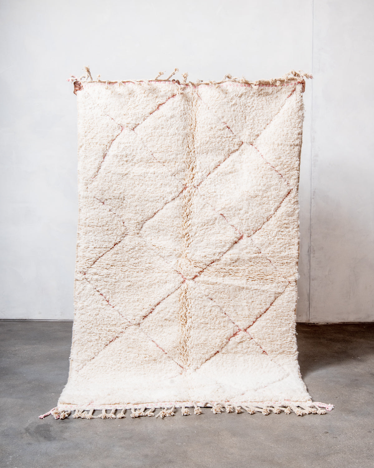 Modern, designer, handcrafted Berber rug from Morocco. Beniourain carpet with beautiful colours and patterns and fluffy wool texture.